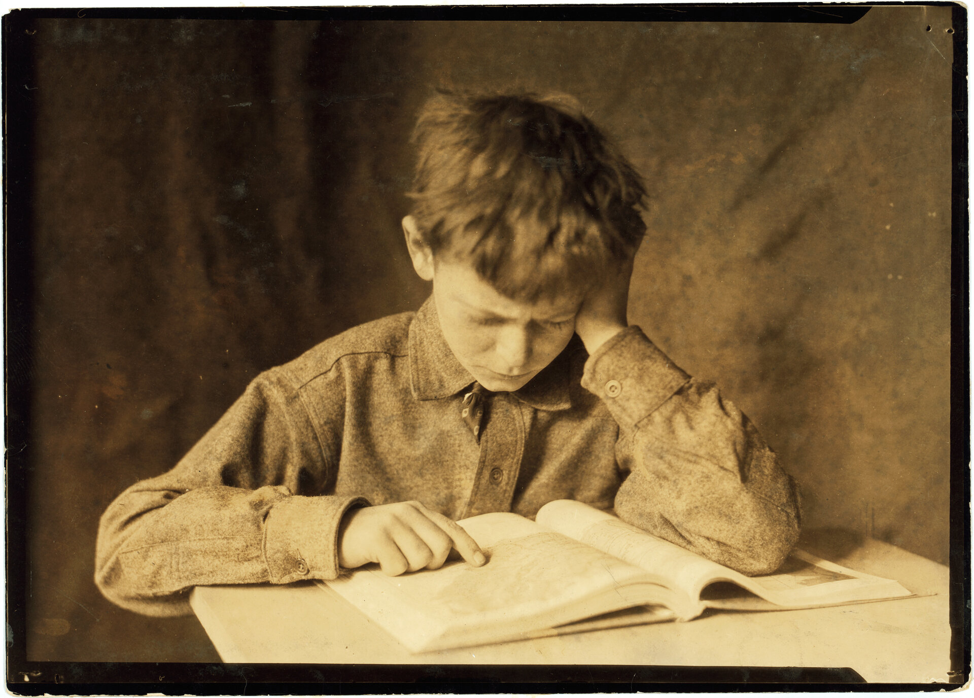 Boy studying by Lewis Hine, c. 1924