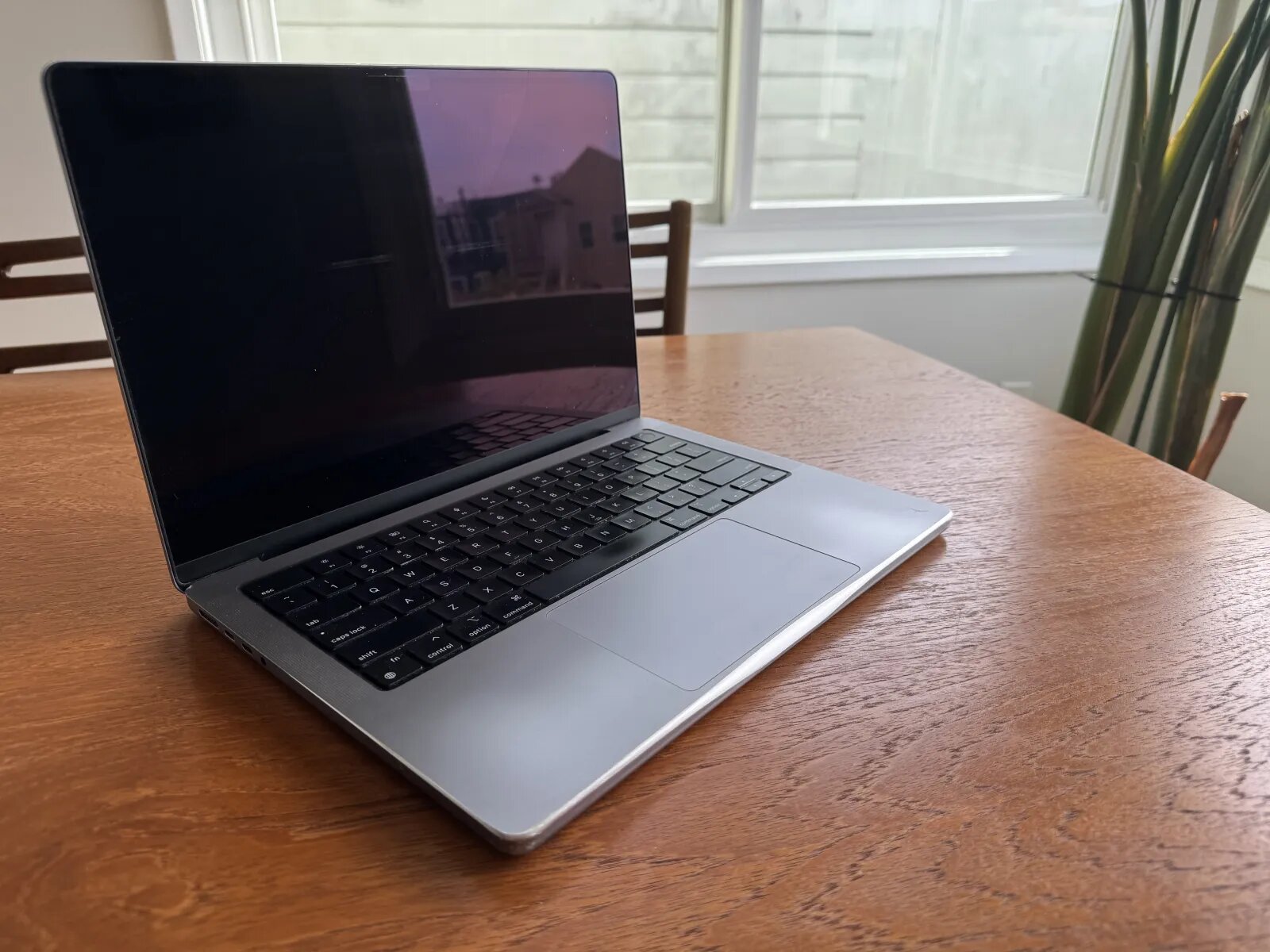 MacBook Pro with its front corners filed down